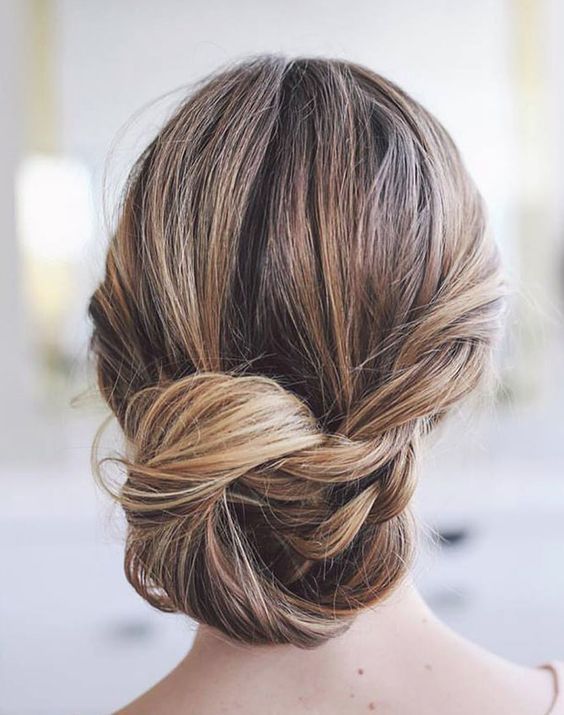 Classic loose side twist low chignon updo wedding hairstyle; Via Craig S. Mackay