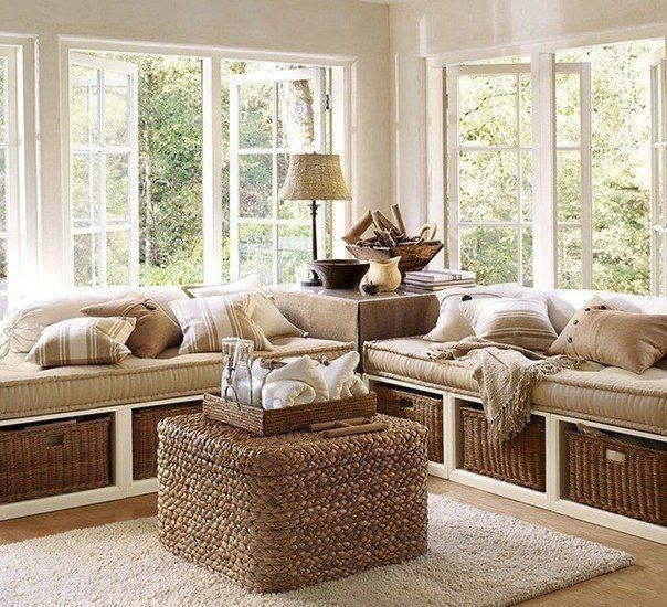 Sun Room Project Cozy Livingroom With Large Window Seats Built In Storage Cubbies For Wicker Baskets A Ottoman Doubling As Coffee Table