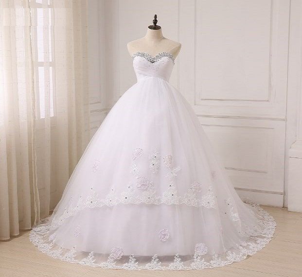 تفسير حلم الفستان الأبيض للحامل والعزباء لابن سيرين موقع مصري Ball Gowns Wedding Wedding Dresses Ball Gown Wedding Dress