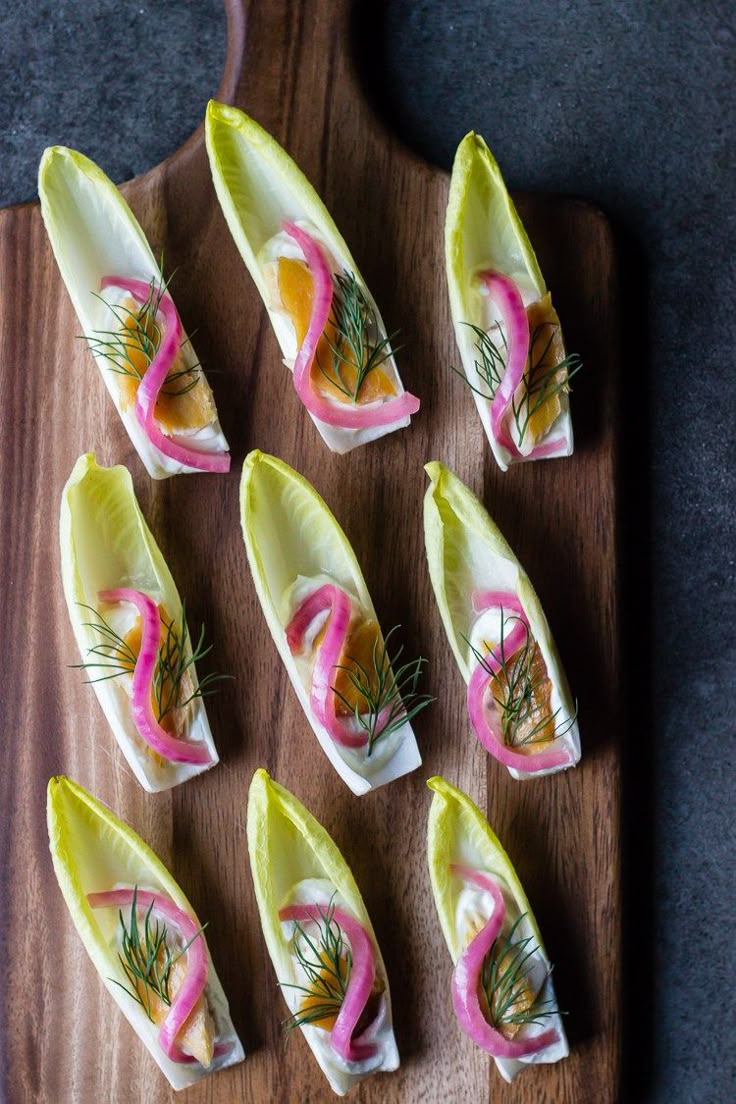 The Cheese Company Pickled Onions ENDIVE WITH WHIPPED GOAT CHEESE, SMOKED TROUT, PICKLED ONION and DILL