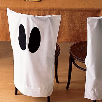 making chair slipcovers for my dining chairs no ghosts ghost chair covers white pillow cases black felt and a hot glue gun this would be cute in
