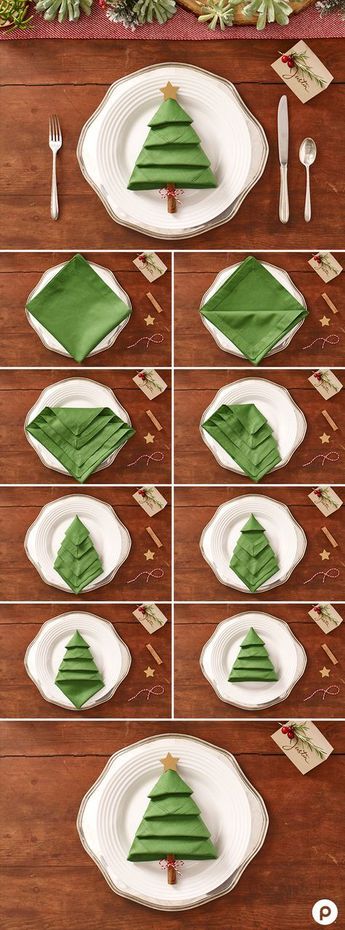 the table is set with green napkins and place settings for christmas tree - shaped plates