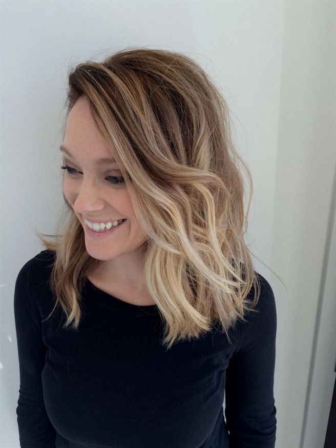Balayage blonde ombré cut and styled into a blunt long