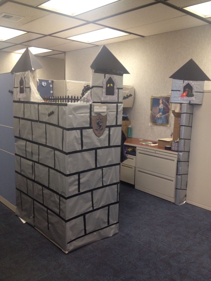 cubicle halloween decoration haunted castle made from card board presentation displays black poster board and duct tape and silver wrapping paper