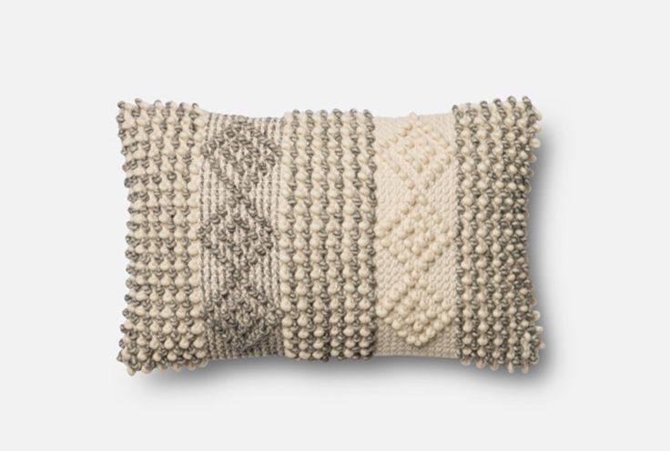 Down feather fill. Wool and cotton construction. Made in India. | Ivory
