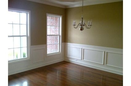 formal dining room: tan/yellow walls, white moulding, trim, filled formal dining room: tan/yellow walls, white moulding, trim, filled