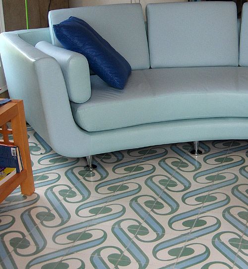 Wow - concrete tile! I need this. Sand - no problem, chlorine - no problem. Dogs...