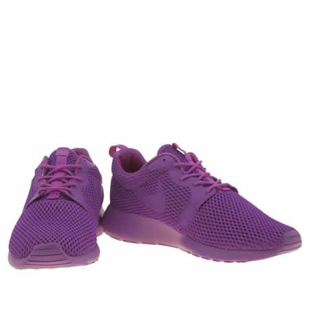 purple and white nike trainers