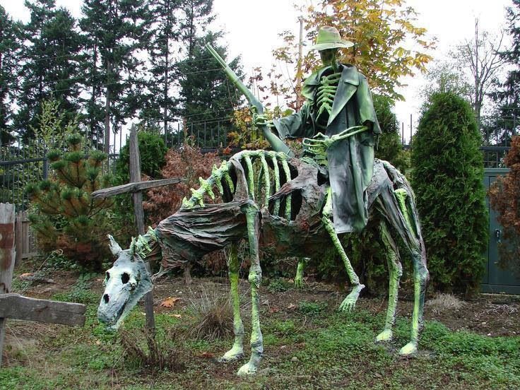a skeleton horse rider outdoor home haunt display during halloween