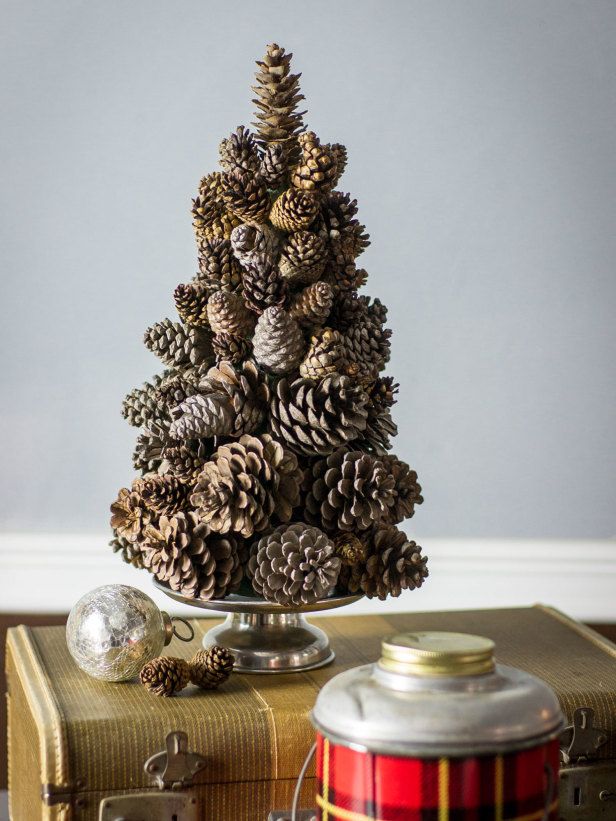 pin by hgtvgardens on easy diy crafts pinterest christmas pine cone christmas tree centerpiece