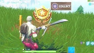 search between three oversized seats location fortnite week 8