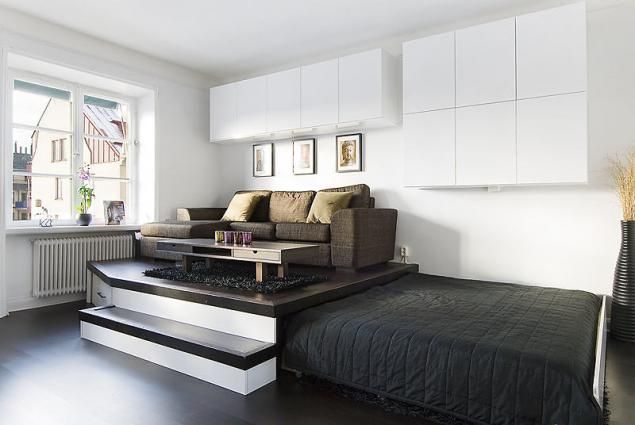 Practical Storage Solution In The Living Room Of A Small Apartment Practical Storage Solution In The Living Room Of A Small Apartment Hidden Bed Platform Bedrooms Pinterest Bedroom E Saving Beds And