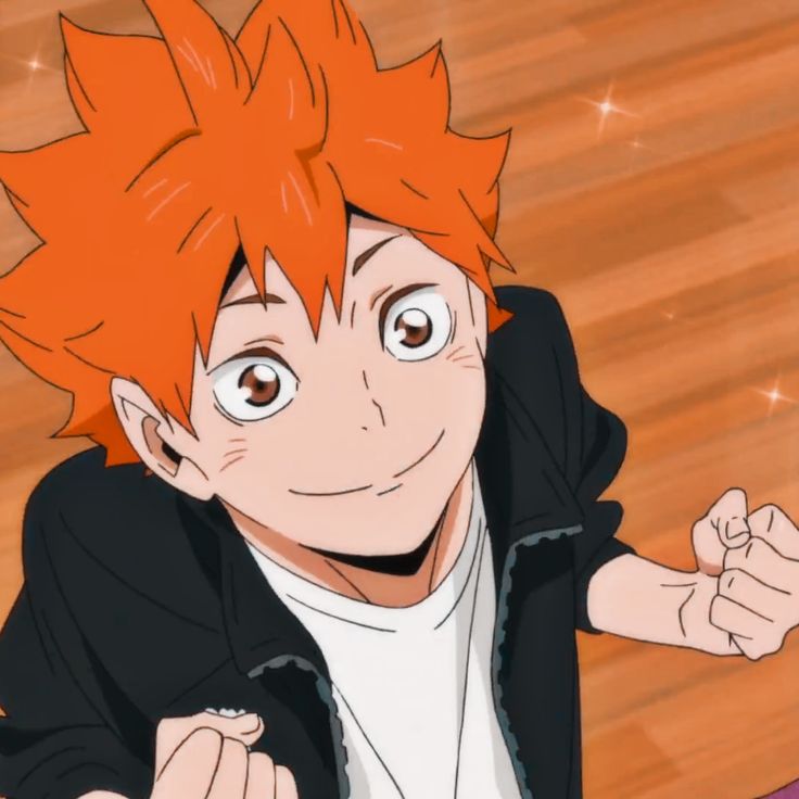 an anime character with orange hair and black jacket on sitting in