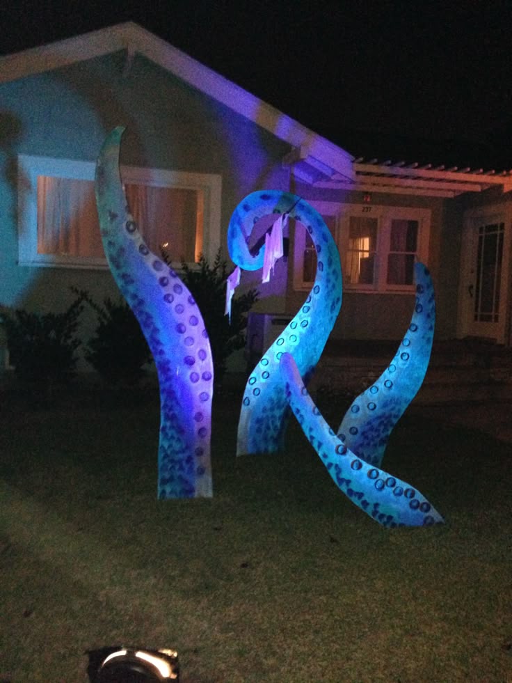 painted sea monster tentacles next to a pirate ship wreckhalloween