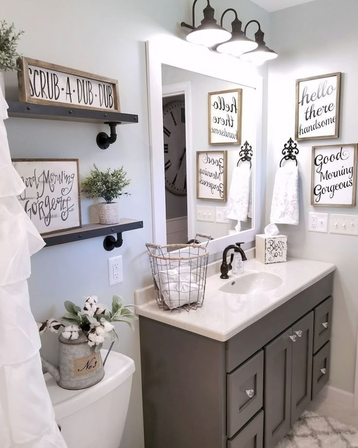 the bathroom is decorated in gray and white