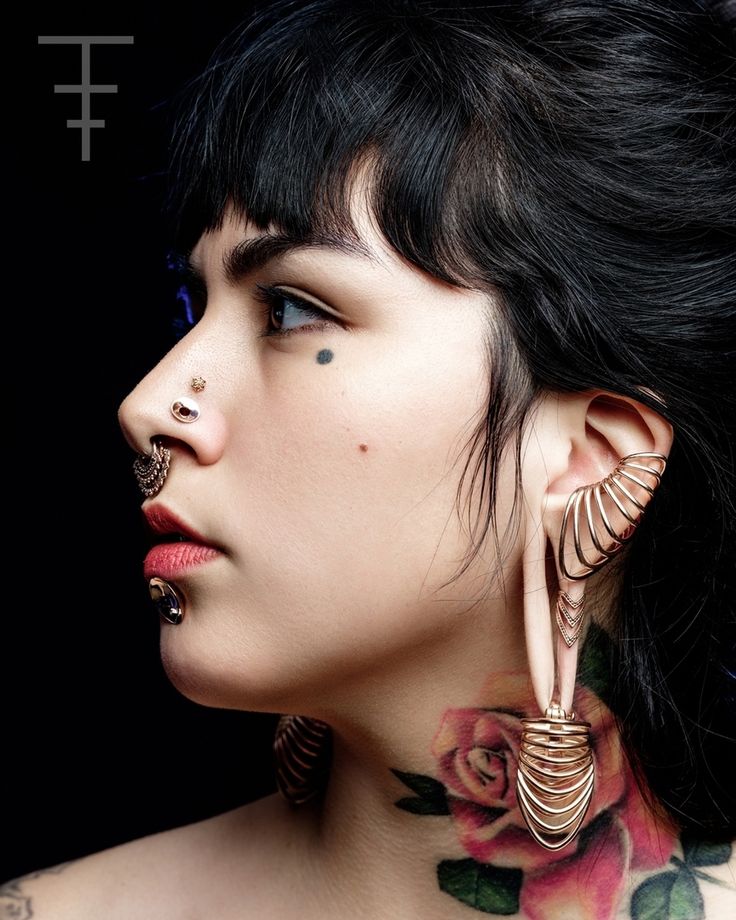 Kartell tattoo piercing