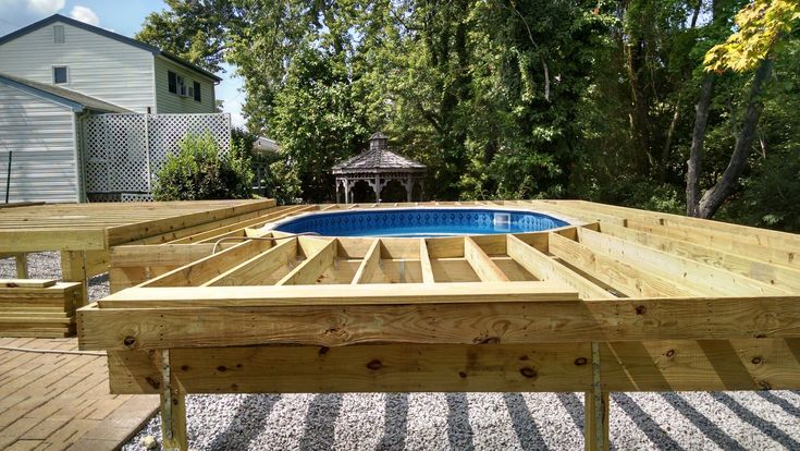 Two Level Deck Oyster Bay Ny Early In The Process And Patio Built Framing For A That Will Surround Above Design Small Designs Deck And Patio Built Framing For A, Above Ground Pool Deck Design Tool