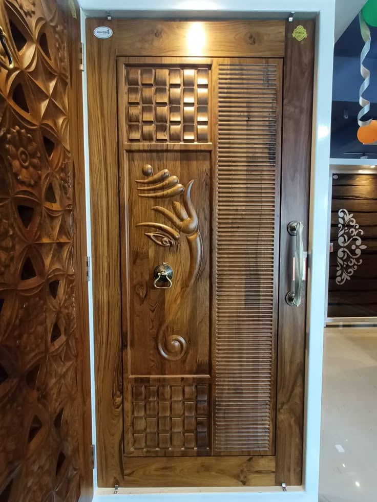 Elegant Wooden Door With Intricate Carvings