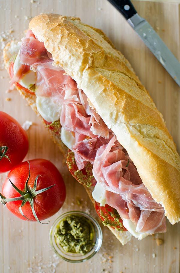 Prosciutto Mozzarella and PestoMarinated Tomato Sandwich Prosciutto Mozzarella and PestoMarinated Tomato Sandwich