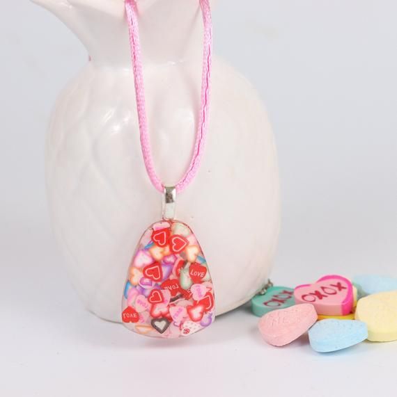 Handmade kawaii epoxy resin heart necklaces.