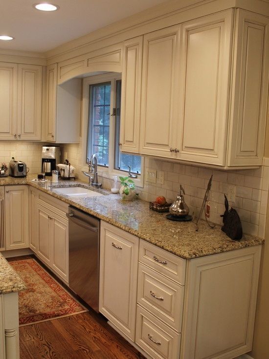 cream cabinets with Cocoa Glaze NVG Granite white subway tile ...