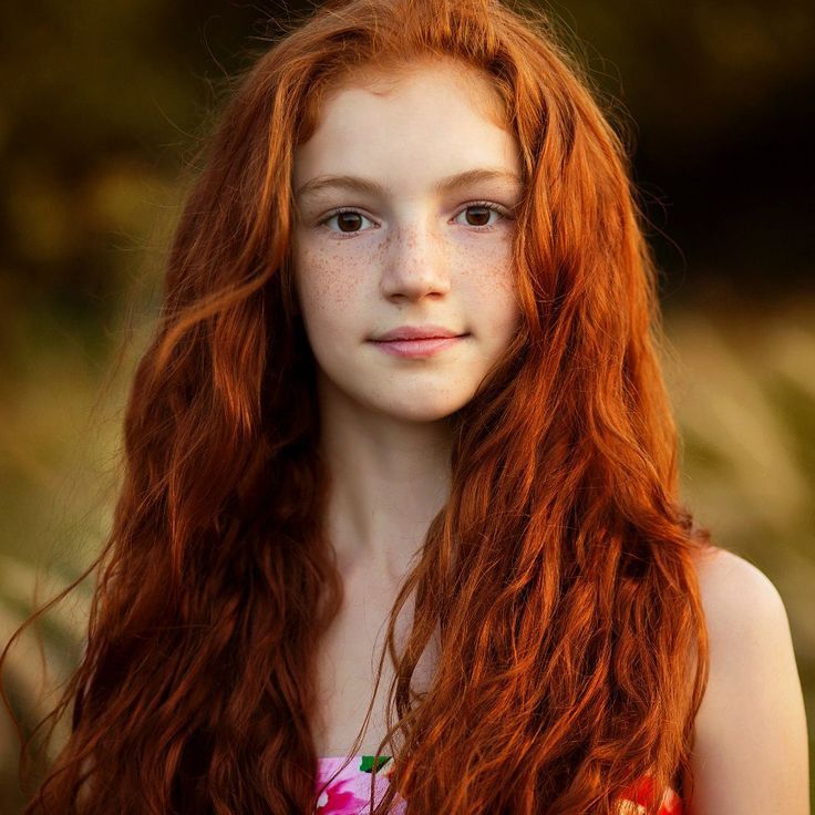 Cute redhead shared long hair