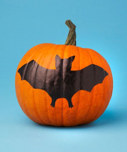 black craft paint is the easiest way to decorate a pumpkin without carving
