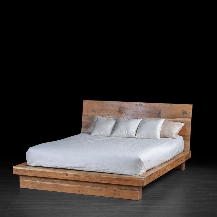 the industrial style tan bed features a low profile acacia