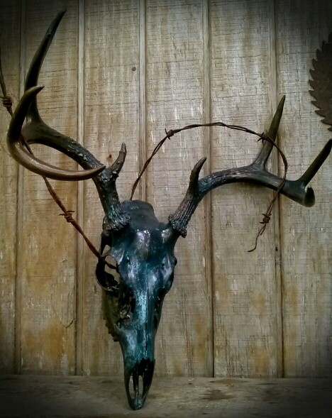 Aged Bronze Metal paint, deer skull with vintage barbedwire. ( For sale