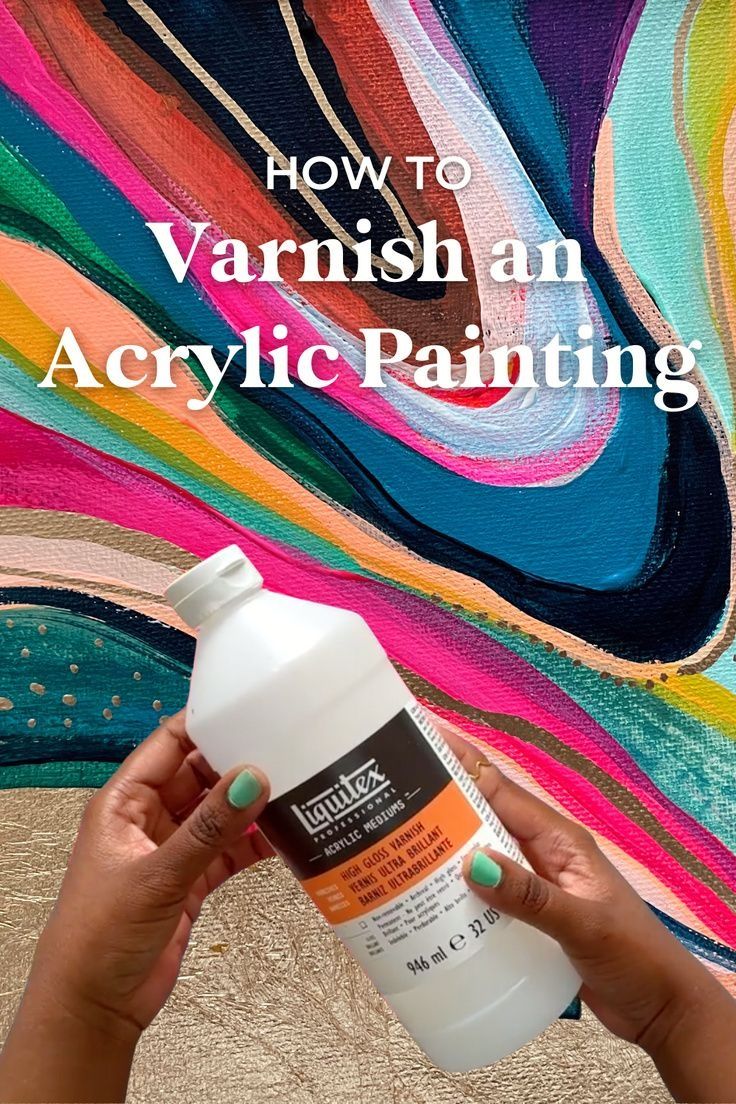 a person holding a bottle of acrylic paint in front of a painting with