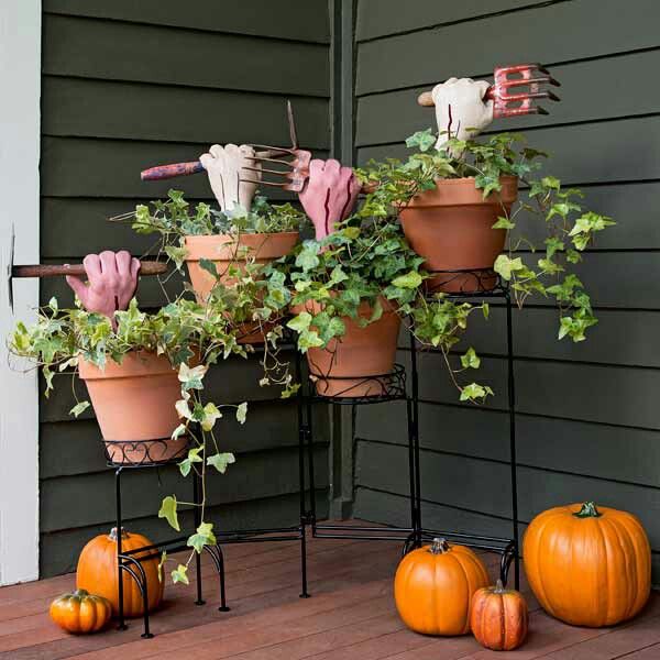 trick out your front entry for halloween with a macabre display of old gardening hand tools the result a creepy show of hands that trick or treaters wont