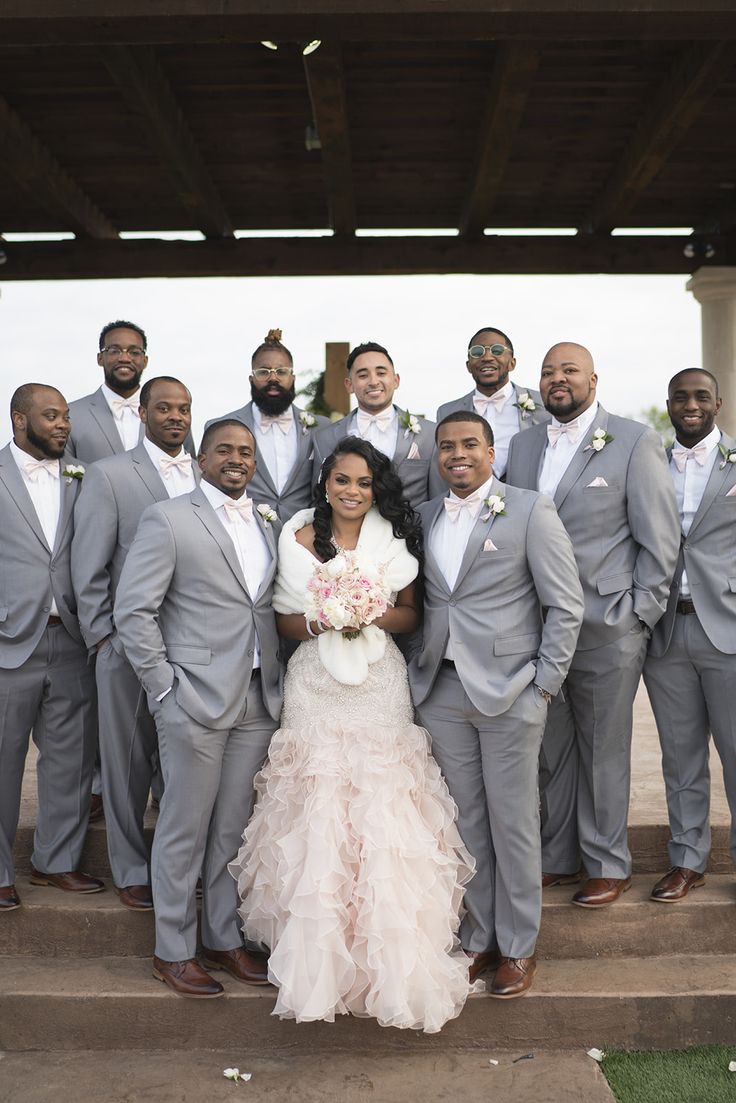 | groomsmen in light grey suits | blush pink wedding groomsmen | winter
