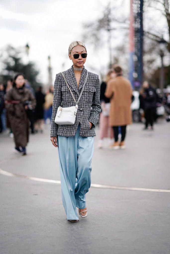 PARIS, FRANCE - MARCH 05: Vanessa Hong wears a gray checked blazer jacket, a whi...