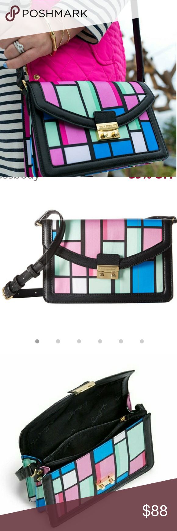 Vera Bradley Faux Leather Trim Crossbody Purse Bag Brand new in Package Vera Bradley Faux Leather Trim Crossbody HandBag Purse Vera Bradley Tess Faux Leather Crossbody Bag in Exotic Floral Grid with Black Faux leather Trim ● Interior has a middle zip pocket ● Two main compartments ● Six card slip pockets ● Zip pocket on back for cellphone ● Flap closure with gold-toned pushlock Dimensions 9" w x 6" h x 3" d with 56" adjustable strap Vera Bradley Bags Crossbody Bags