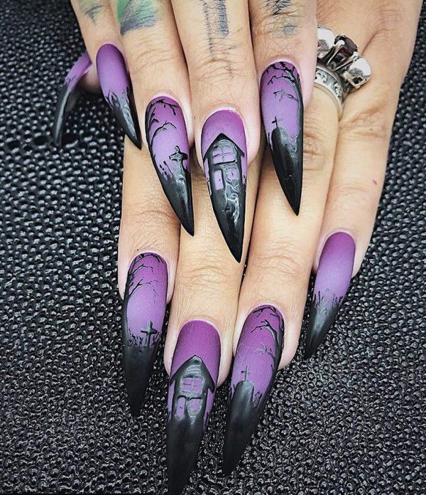 Interesting purple and black Halloween nails. Pic by ...