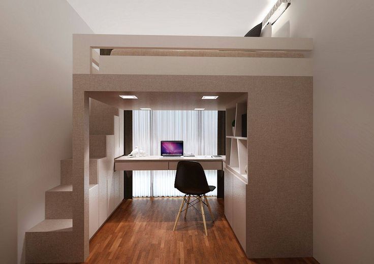 A Room With A Desk And Stairs In It A Room With A Desk And Stairs In It