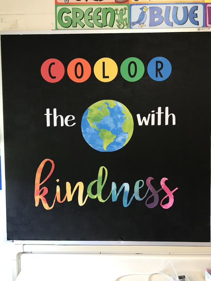 a blackboard with the words color, the earth and kindness written on it