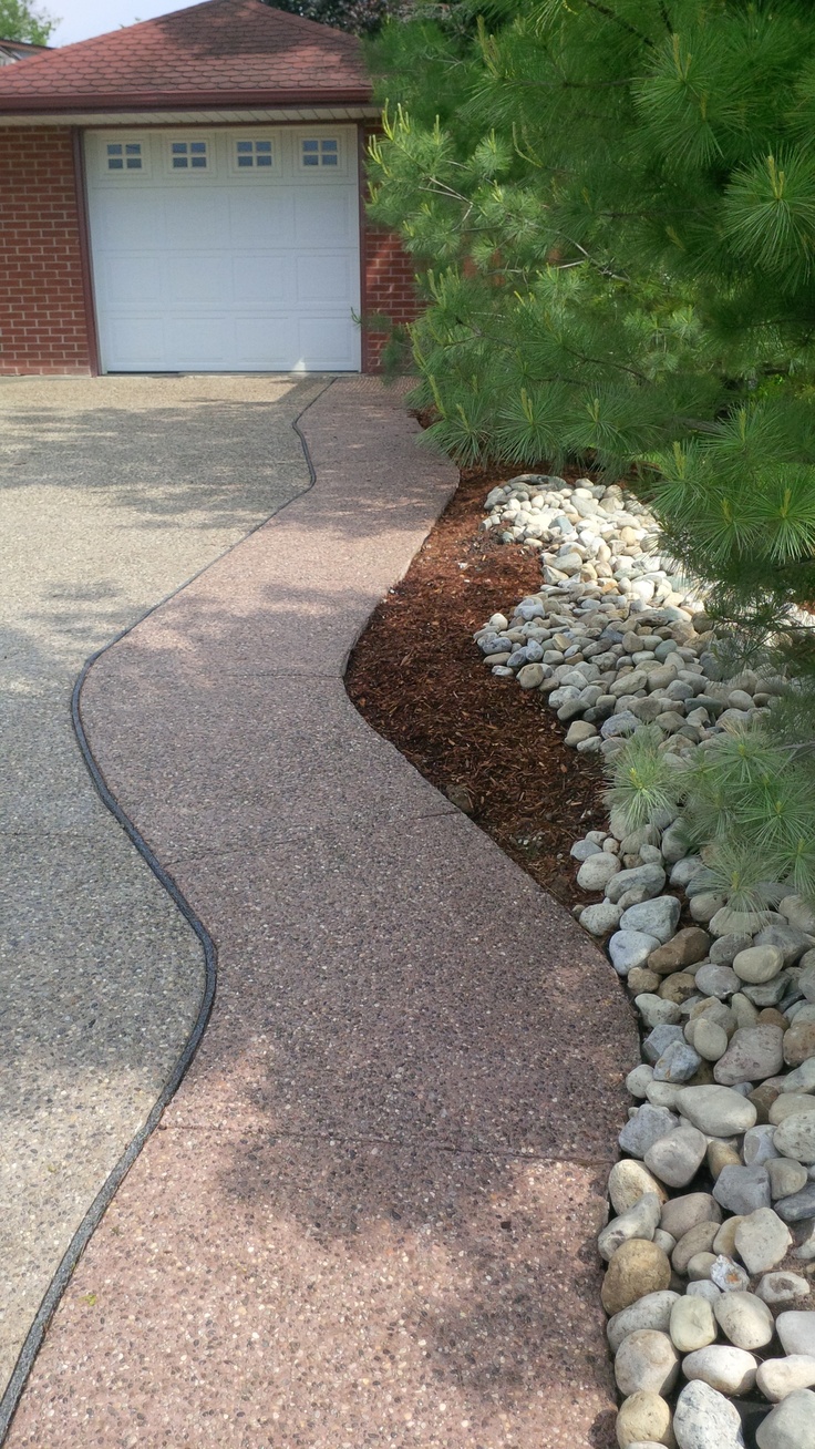 The 8 Best Aggregate Patio Ideals Images On Pinterest Concrete Exposed aggregate driveway, some river stone and landscaping. Burgundy colour, Acorn colour. - The 8 Best Aggregate Patio Ideals Images On Pinterest Concrete