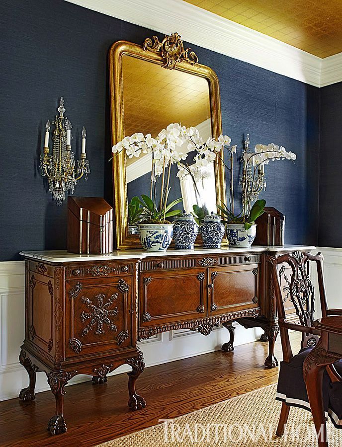 Dining Room Server An Antique In The Matches Dining Room Server An Antique In The Matches Clic Look Of Table And Chairs A Large Mirror Above Reflects Ceiling S Gold