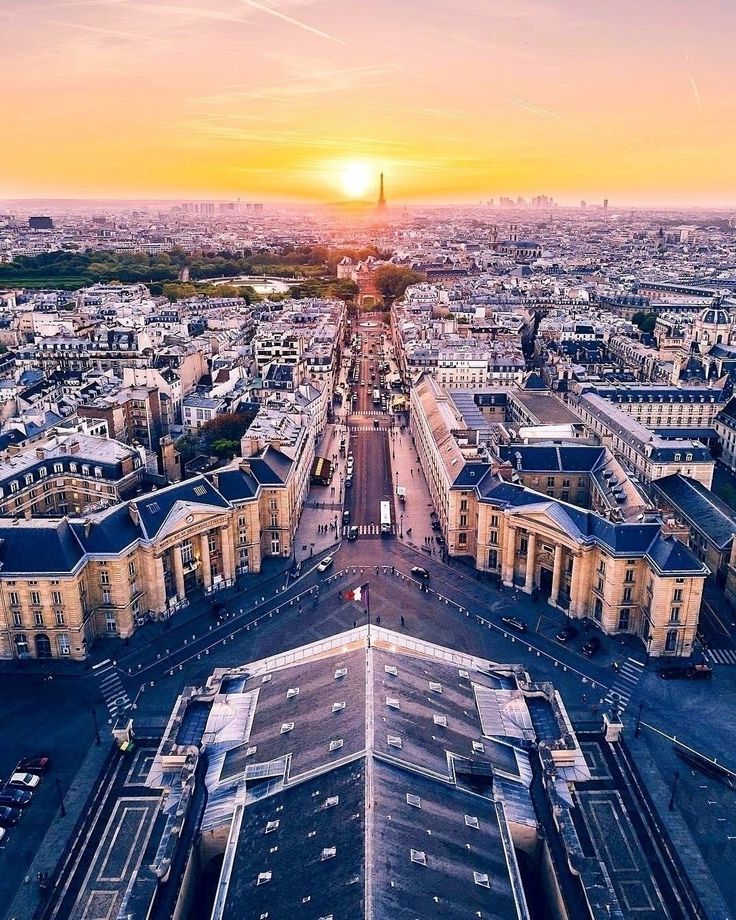 an aerial view of the eiffel tower in paris, france at sunset or sunrise