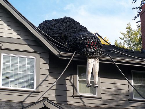front porches a fall drive by house roofholidays halloweenhalloween decorationshalloween funlarge spiderson