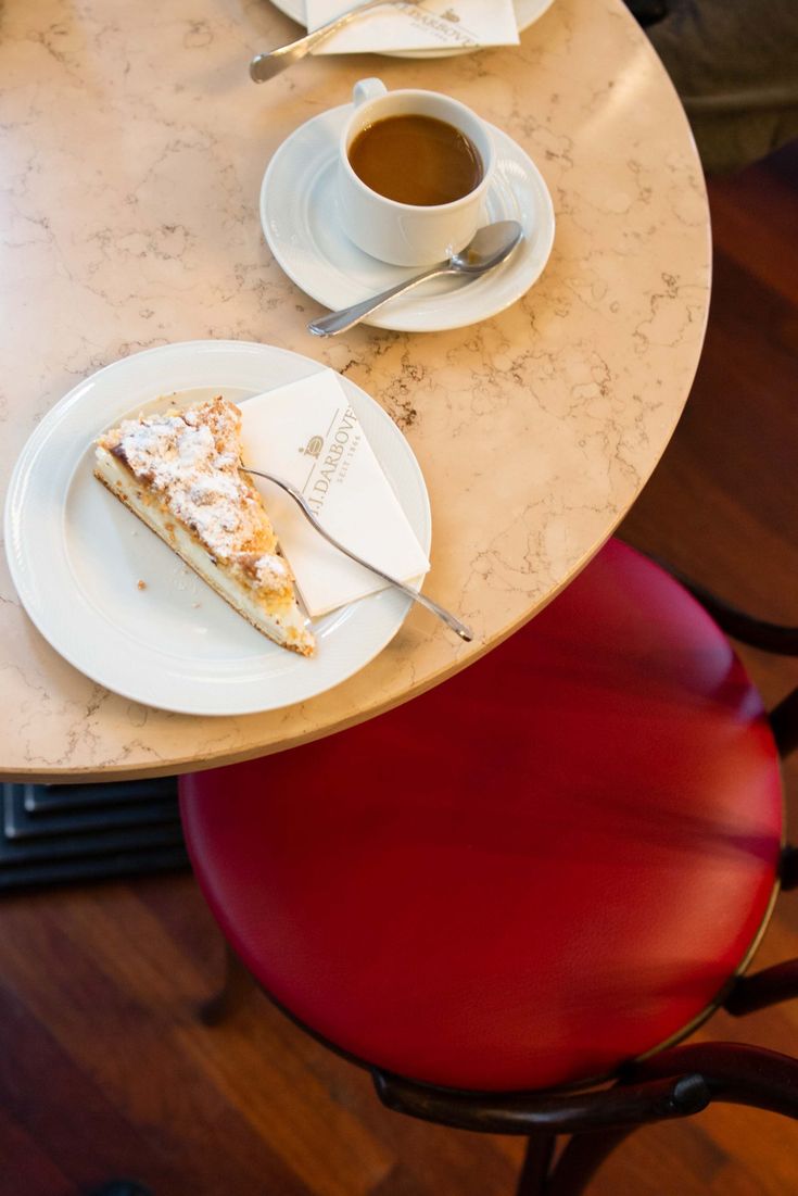 There Is A Piece Of Pie On The Table With Two Cups Of Coffee Next To It there-is-a-piece-of-pie-on-the-table-with-two-cups-of-coffee-next-to-it