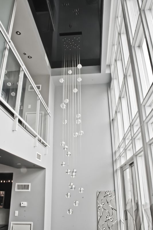 14 Best Stairs To Deck Images On Ceiling Lamps A Gorgeous Extra Long Chandelier And High Gloss Black Stretch Ceiling Do Justice To This