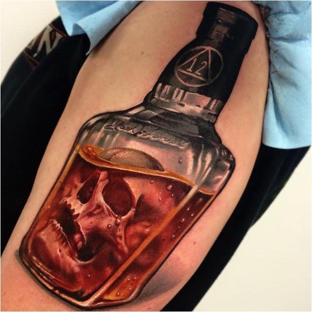 Tattoo Whiskey Bottle Tattoo By Jesse Rix Click To See More Skull Tattoo Circle Tattoos Bottle Tattoo