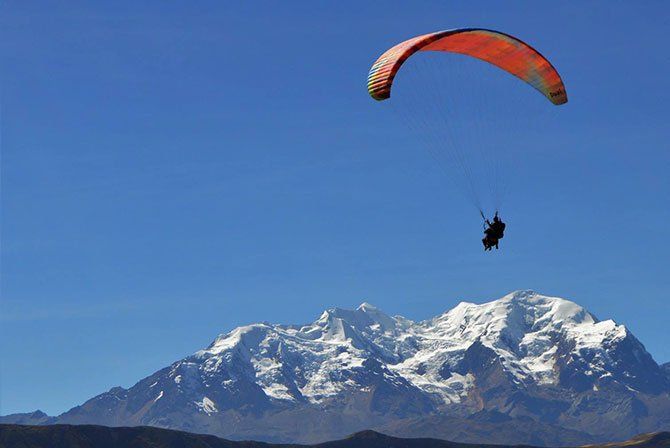 12 of the Best Things To Do In Bolivia - Kanoo Tours | Paragliding, Bolivia, La paz