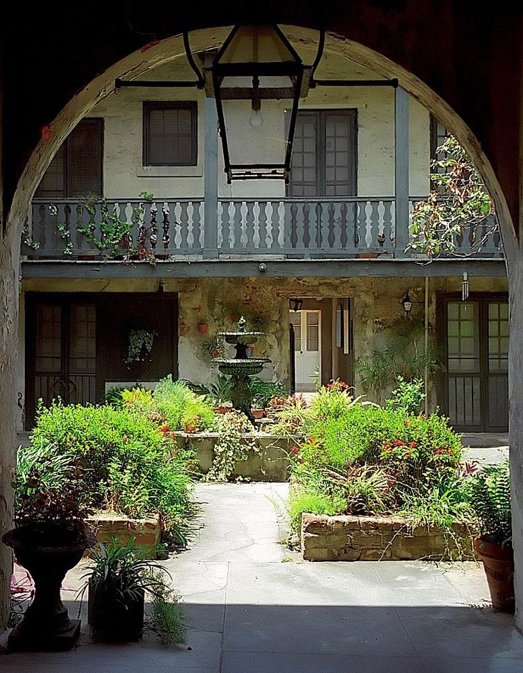 A courtyard garden in the French Quarter in New Orleans. Photograph by David Ohm...