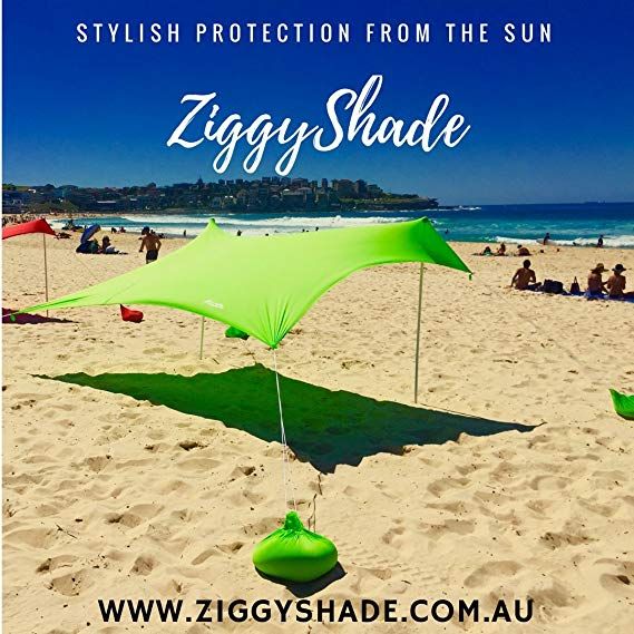 ZiggyShade Family Beach Sunshade – Lightweight Sun Shade Tent with Sandbag Anchors & 4 Free Pegs | UPF50+ UV Quality Lycra Fabric | Large & Portable | ZiggyShade Family Beach Sunshade – Lightweight Sun Shade Tent with Sandbag Anchors & 4 Free Pegs | UPF50+ UV Quality Lycra Fabric | Large & Portable |