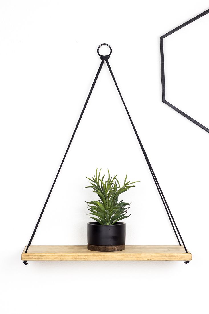 Make a simple hanging shelf out of wood. This easy DIY idea looks great on your … Make a simple hanging shelf out of wood. This easy DIY idea looks great on your …
