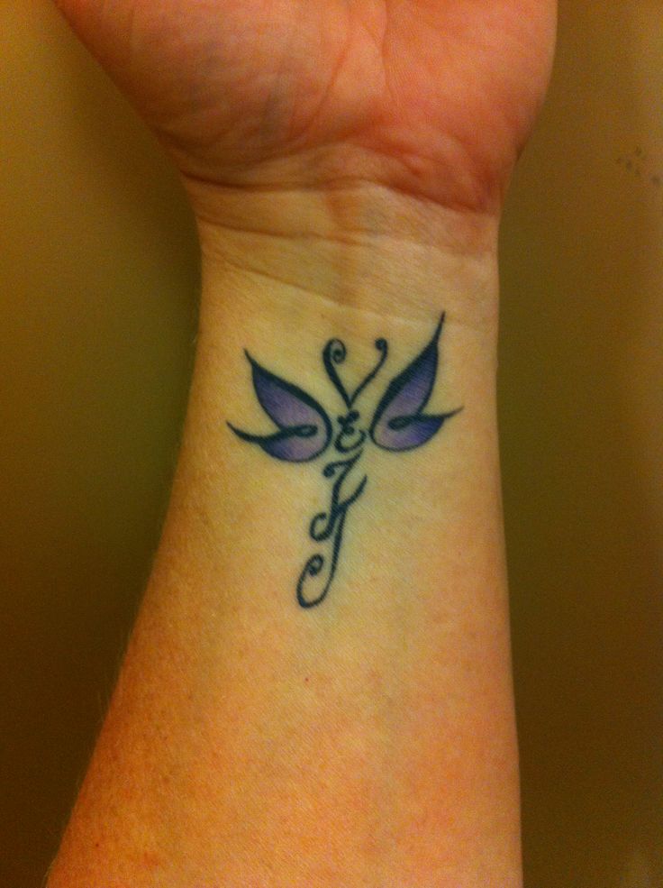 children s initials as the butterfly body wrist tattoo children s initials as the butterfly body wrist tattoo
