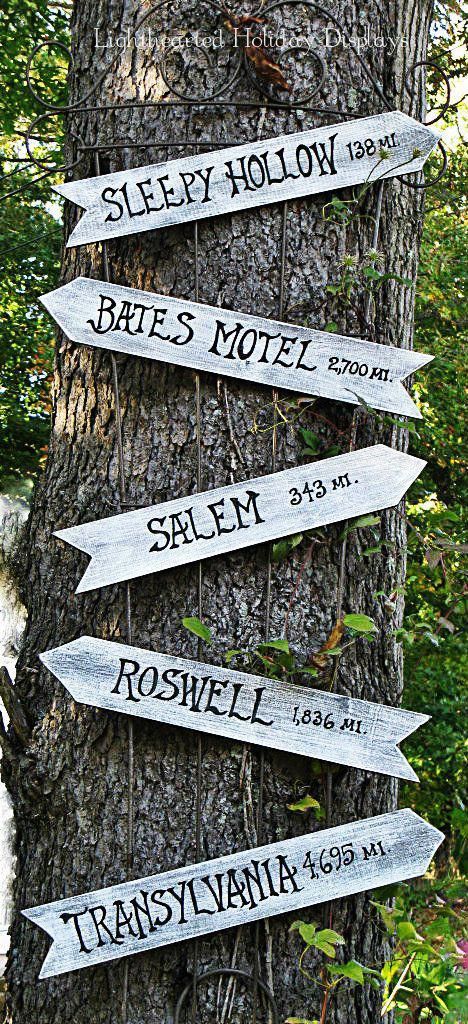 Point out spooky attractions near and far with a homemade sign post hung up on a...